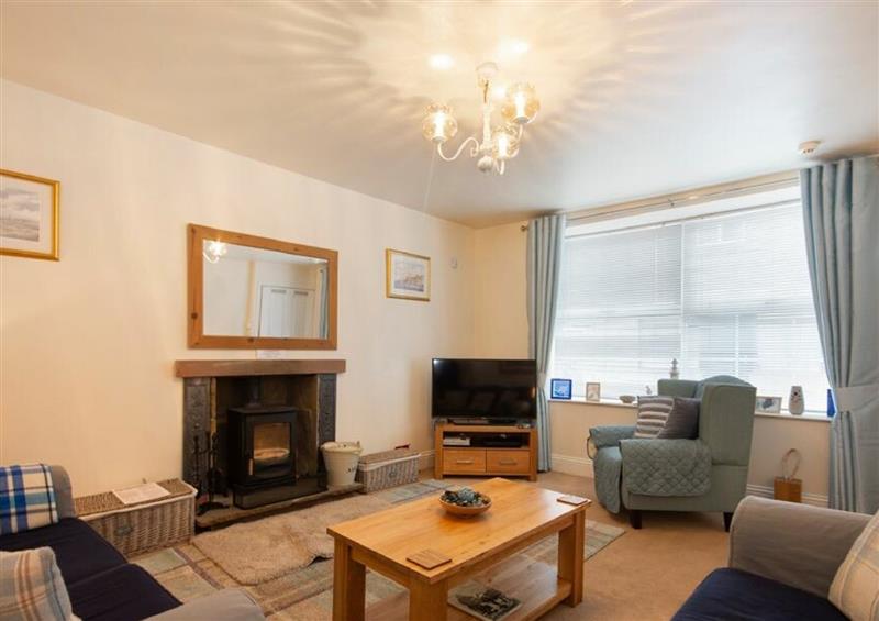 Enjoy the living room at Lobster Pot Cottage, Seahouses
