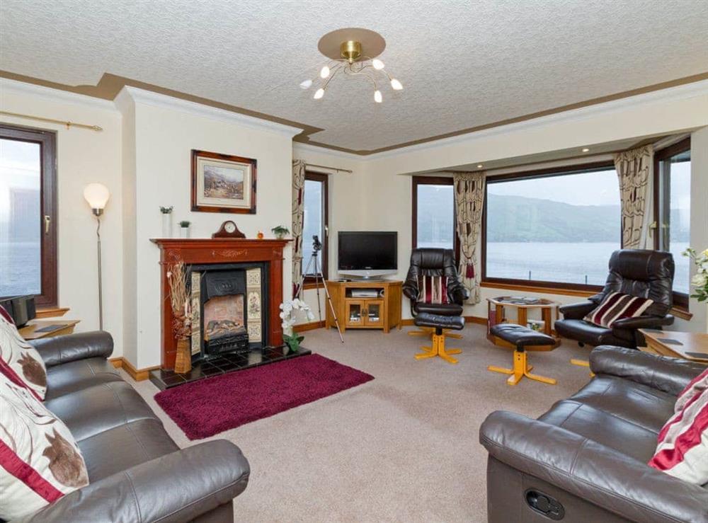 Living room with fantastic views (photo 2) at Loch Duich Cottage in Inverinate, by Kyle, Ross-shire., Ross-Shire