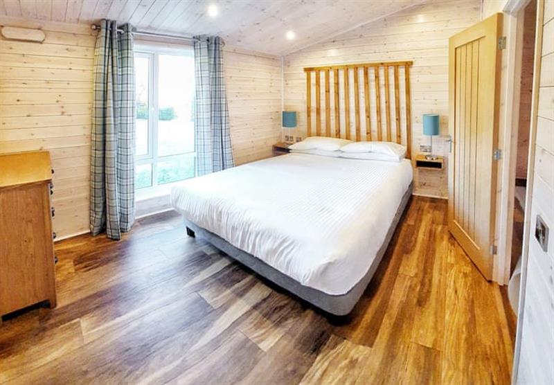 Double bedroom in Skyline 3 at Loch Lomond Castle Lodges in Arden, Scotland