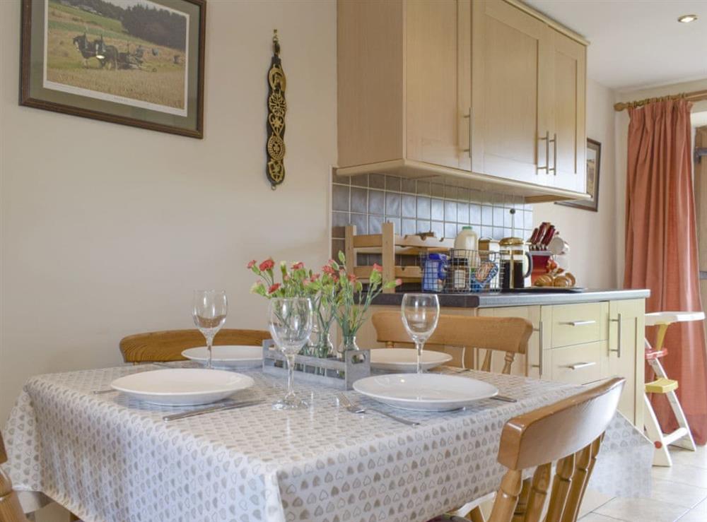 Convenient dining area within kitchen at The Ploughmans, 