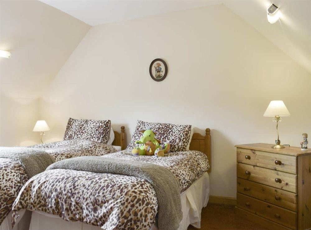 Good sized twin bedroom at The Stables, 