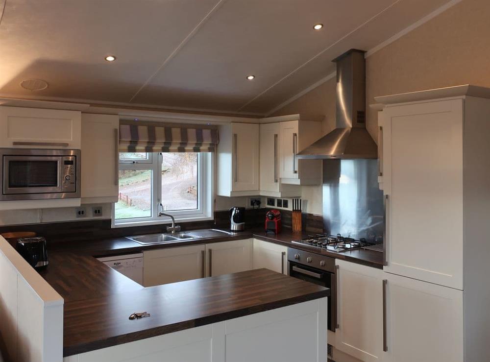 Well-equipped fitted kitchen at Nevis, 