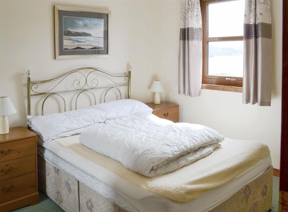 Comfortable double bedroom at Lochinchard Cottage in Kinlochbervie, Sutherland, Great Britain