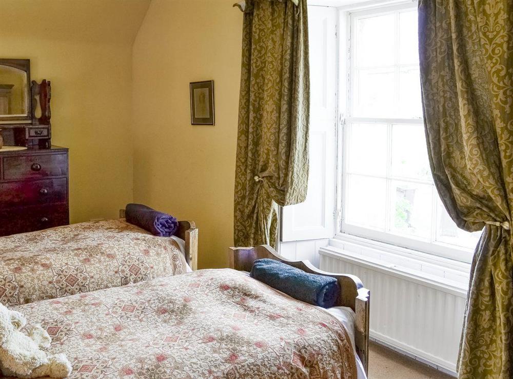 Twin bedroom at Lochside Garden House in Kelso, Roxburghshire