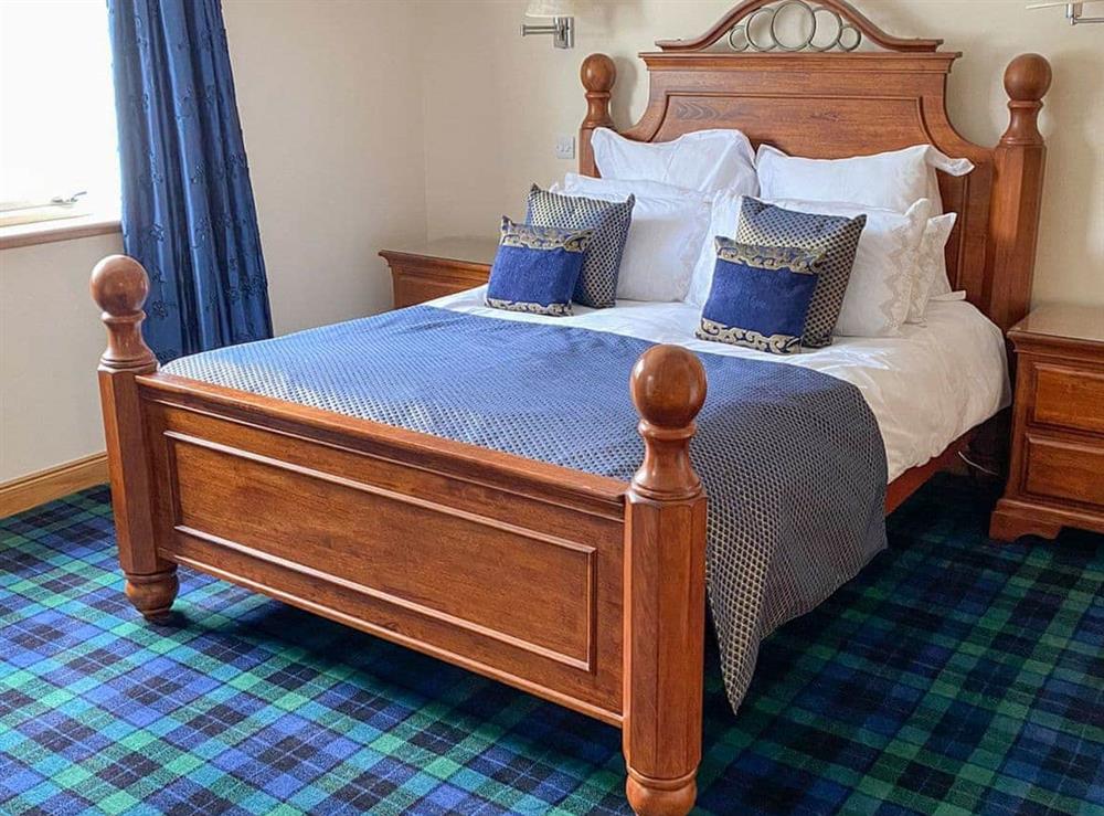 Master bedroom at Lochside House in Kyle, Ross-Shire