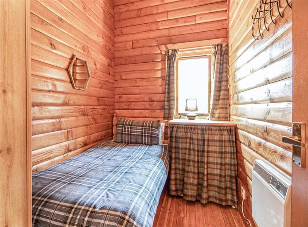 Single bedroom at Lochside Log Cabin in Brora, Sutherland