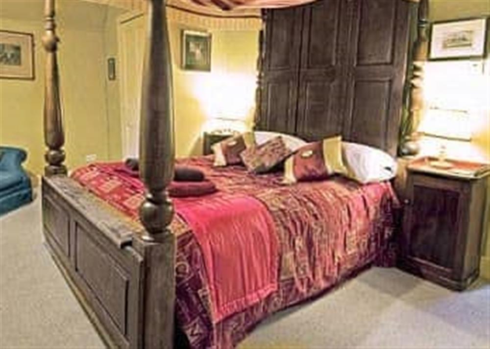 Four Poster bedroom at Lochside Stable House in Yetholm, near Kelso., Rroxburghshire