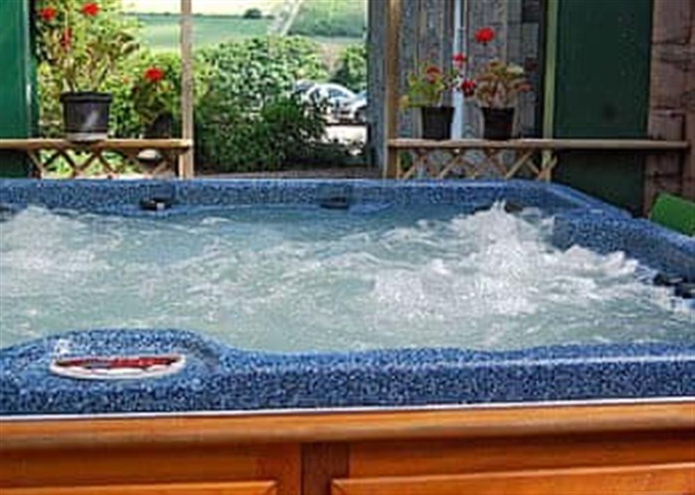 Hot tub at Lochside Stable House in Yetholm, near Kelso., Rroxburghshire