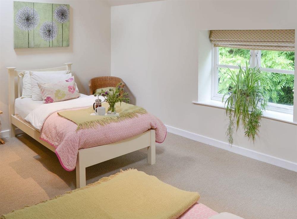 Good-sized twin bedroom at Lock Cottage in Aylsham, Norfolk., Great Britain