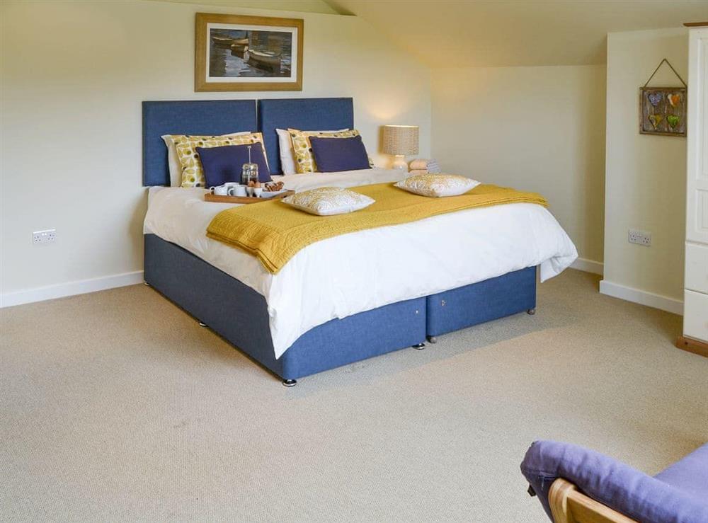 Peaceful bedroom with zip-link bed set as double at Lock Cottage in Aylsham, Norfolk., Great Britain