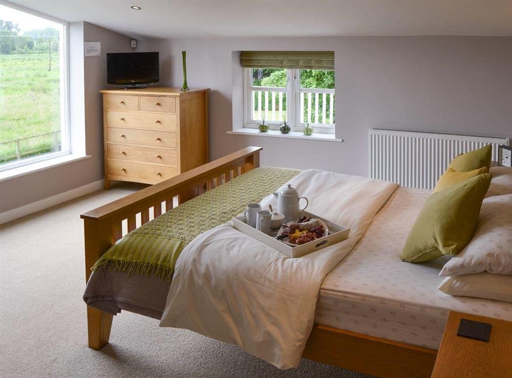 Relaxing en-suite master bedroom at Lock Cottage in Aylsham, Norfolk., Great Britain