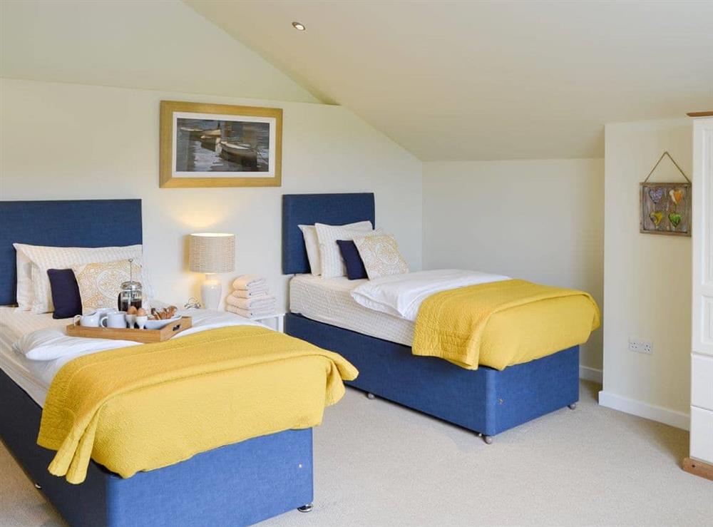 Zip-link bedroom set as twin bedroom at Lock Cottage in Aylsham, Norfolk., Great Britain