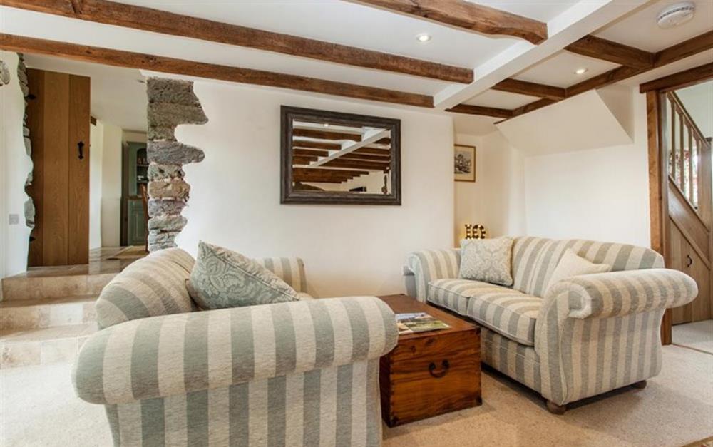 Two comfortable 2 seater sofas' in the adjoining seating area. at Locks Farm in East Prawle