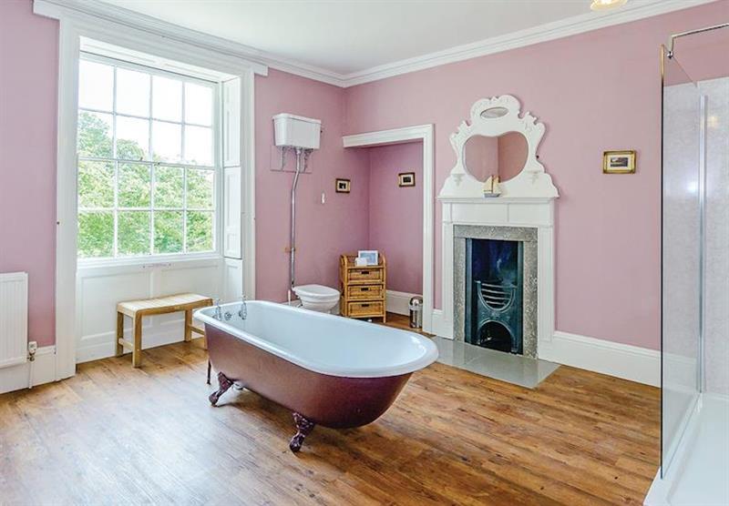 Standalone bath in Lode Hall at Lode Hall Cottages in Three Holes, Cambridge