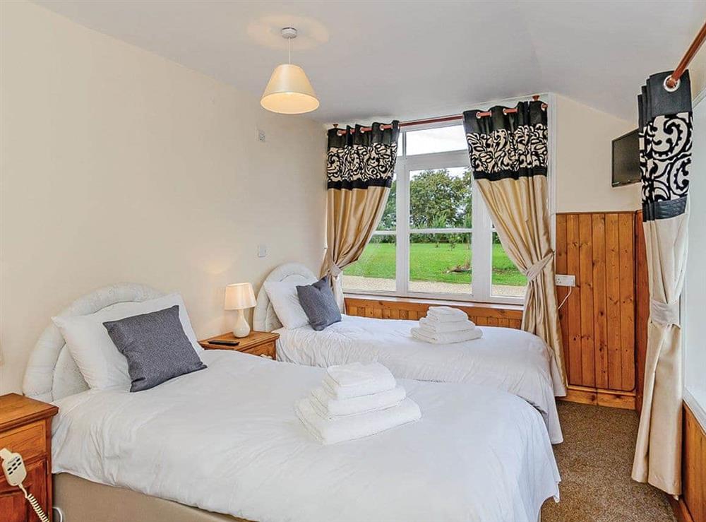 Restful twin bedroom at Lode Hall in Three Holes, near Downham Market, Norfolk