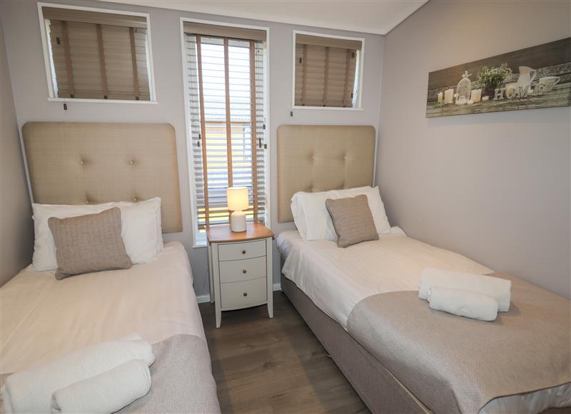 A bedroom in Lodge 1 at Lodge 1, Delamere