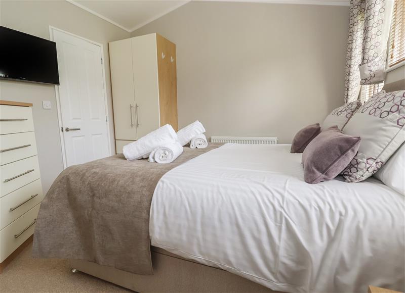 A bedroom in Lodge 1 at Lodge 1, St Asaph