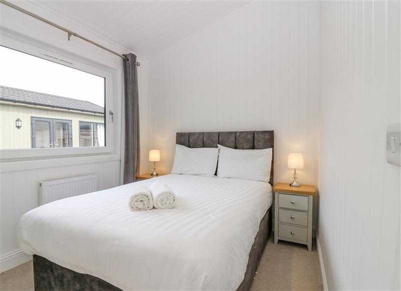 A bedroom in Lodge 18 - Ruthven (Hideaway) at Lodge 18 - Ruthven (Hideaway), Errol