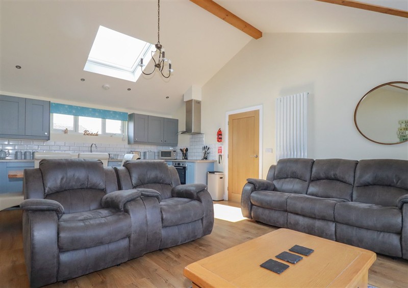 Relax in the living area at Lodge 18, St Merryn
