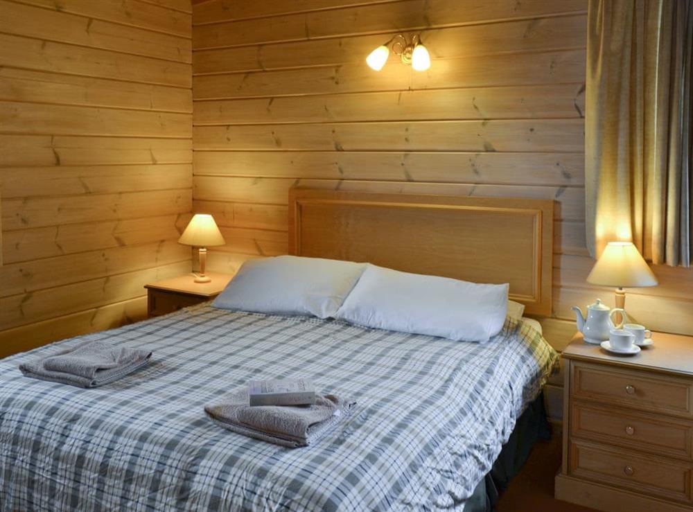 Relaxing double bedroom at Lodge 18 in Woosley, Bideford, Devon