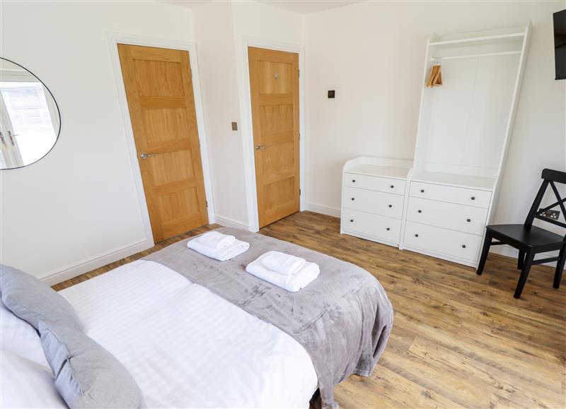 A bedroom in Lodge 24 at Lodge 24, Thorpe-on-the-Hill near South Hykeham