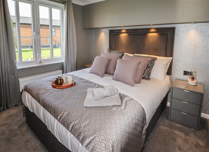 One of the bedrooms at Lodge 28, Delamere