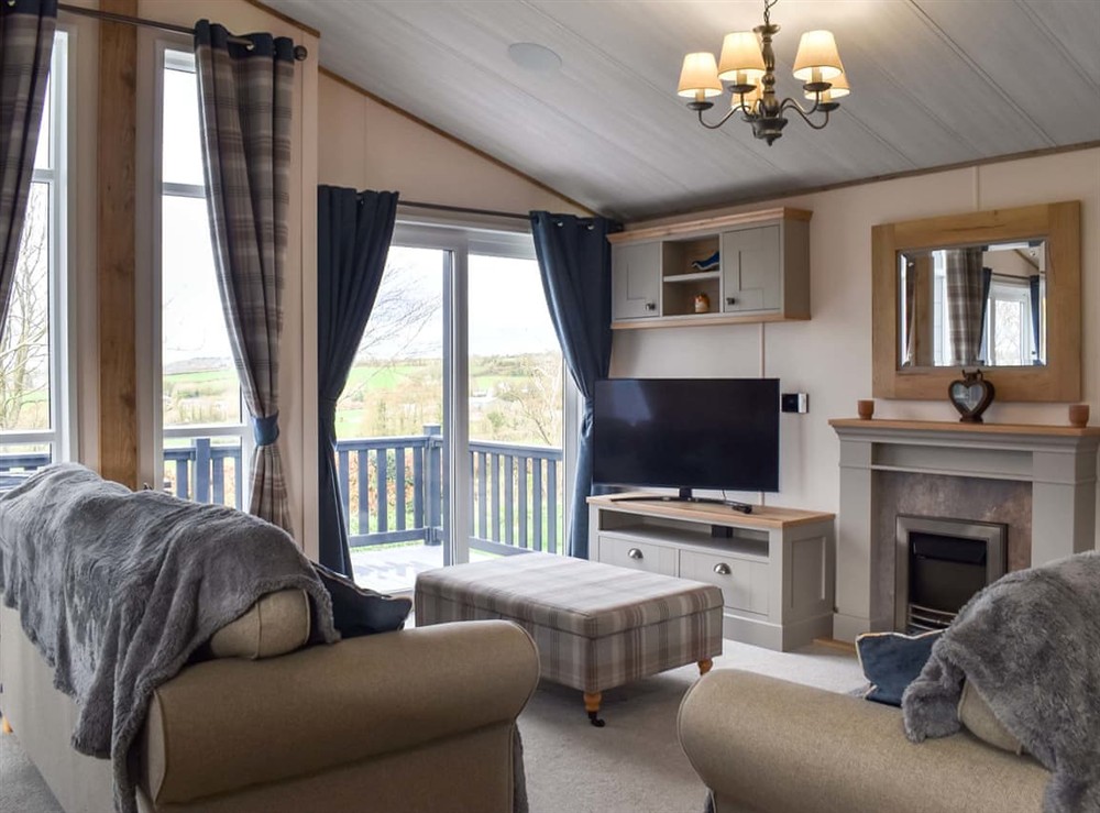 Open plan living space at Lodge 28 in Lanteglos, near Fowey, Cornwall