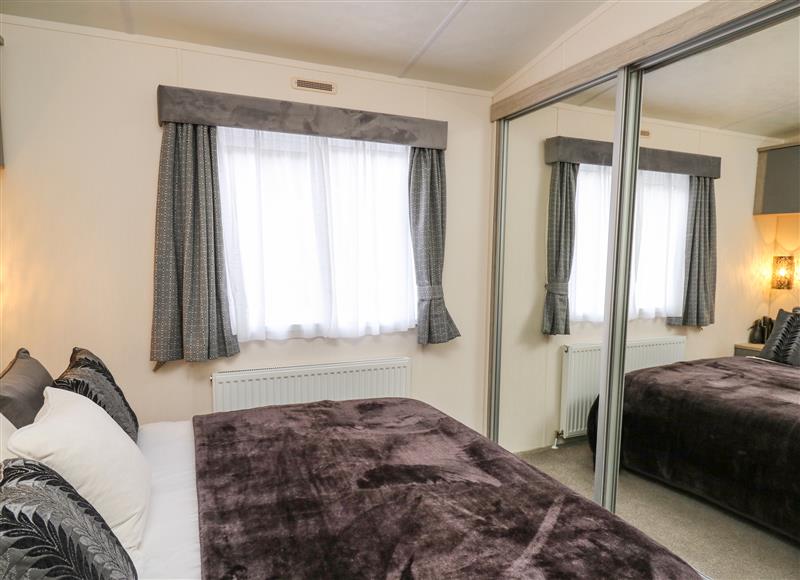 This is a bedroom (photo 3) at Lodge 43. Deri, Llanarth