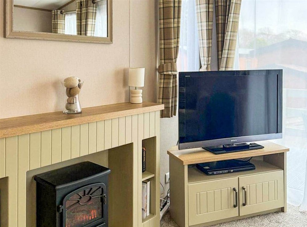 Open plan living space (photo 2) at Lodge 58 in Aviemore, Inverness-Shire