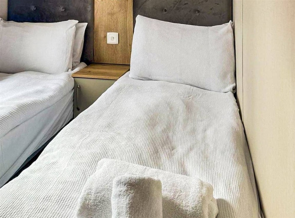 Twin bedroom at Lodge 58 in Aviemore, Inverness-Shire
