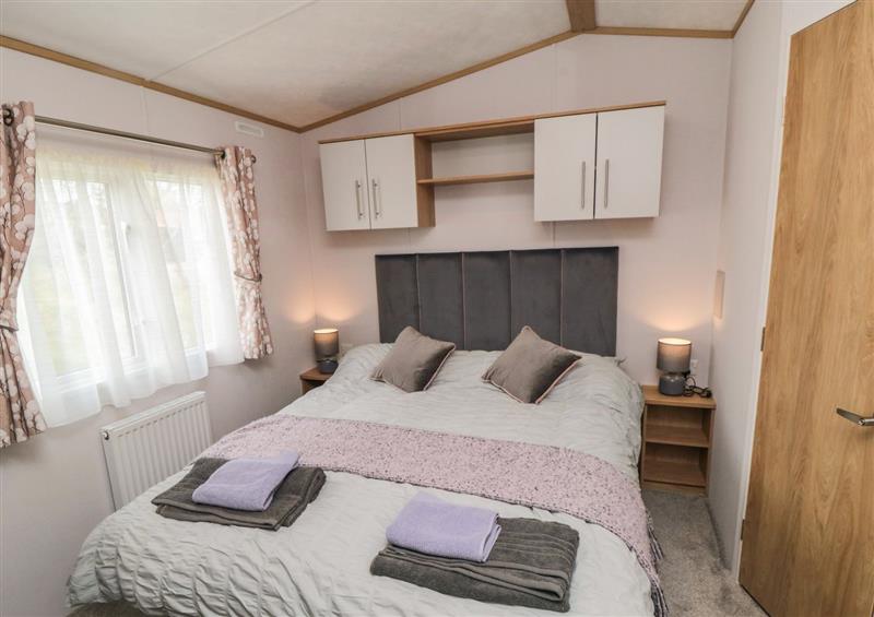 A bedroom in Lodge 7 - Seabreeze Retreat at Lodge 7 - Seabreeze Retreat, Bridlington