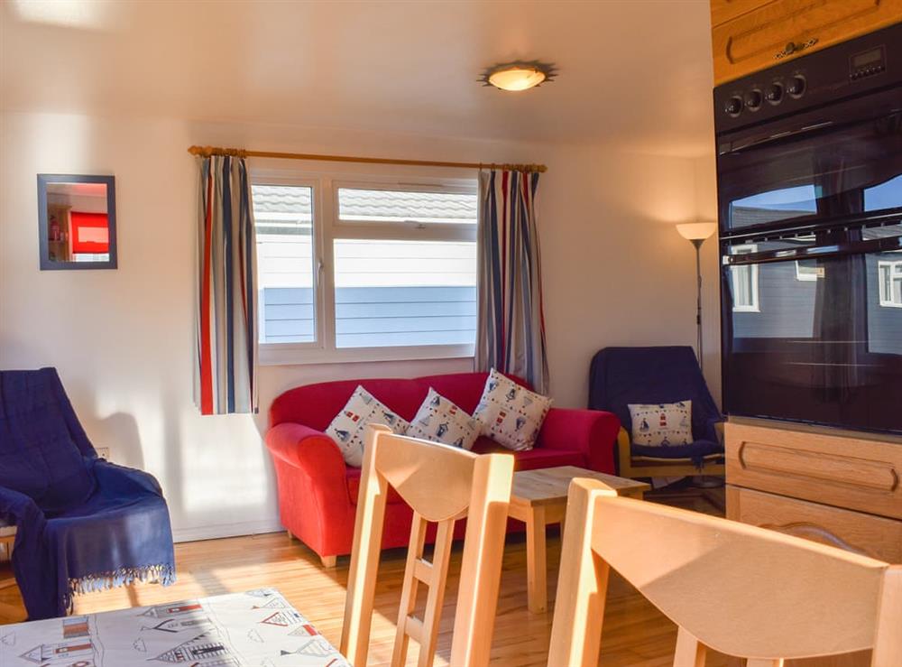Open plan living space at Lodge 73 in St Merryn, near Padstow, Cornwall