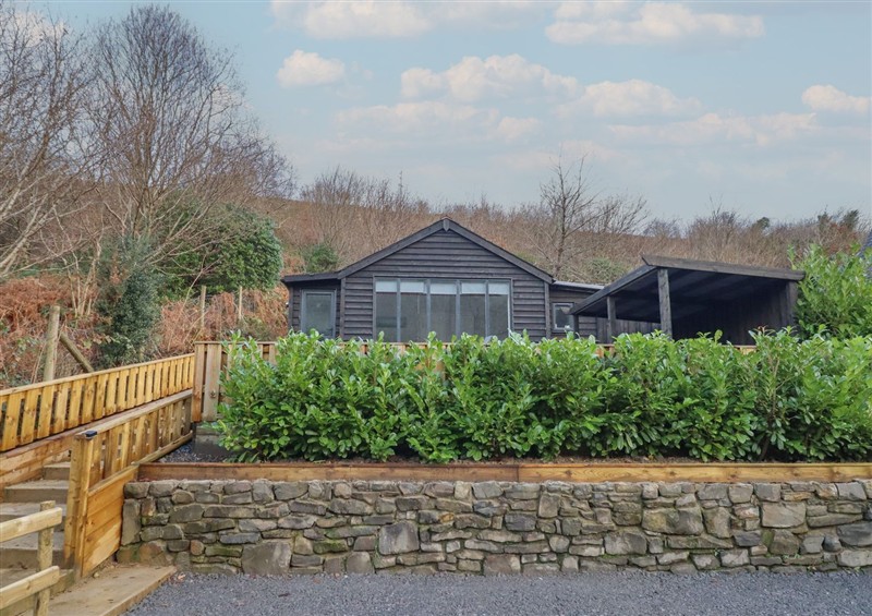 Enjoy the garden at Lodge at Nadur, Commins Coch near Machynlleth