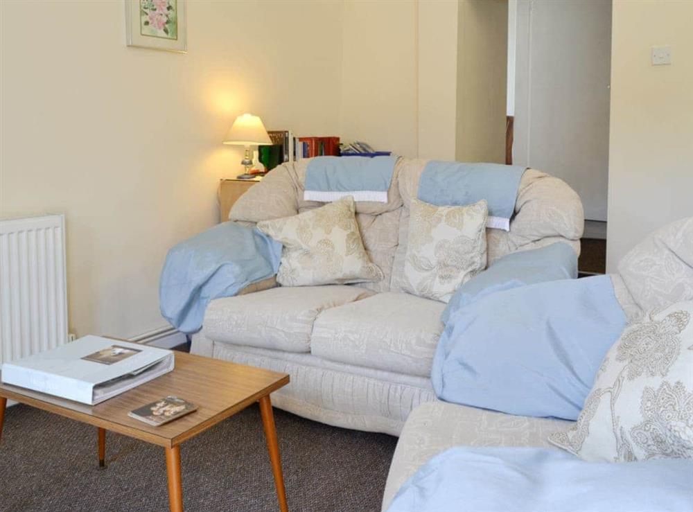 Comfortable seating within living area at Lodge Cottage in Scarning, near Dereham, Norfolk