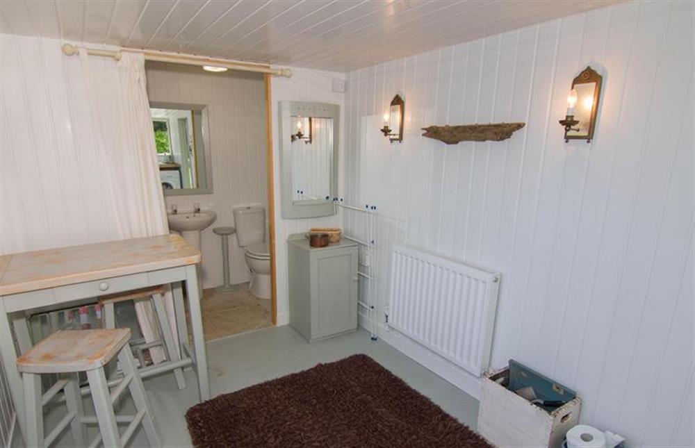Ground floor:  Utility/garden room with door to shower rooom at Lodge End, Heacham near Kings Lynn