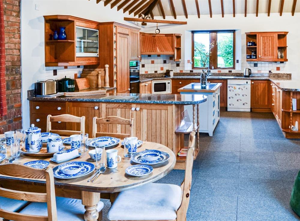 Why not have breakfast in the kitchen, it makes life easy and relaxing, also a great place for card games at Lodge Farm Barn in South Walsham, North Norfolk, England