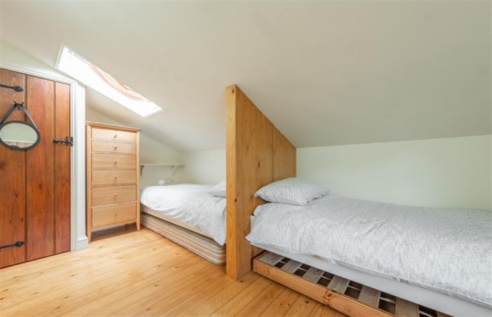 First floor: Bedroom three with twin 3ft single beds at Loke Cottage, Bessingham near Norwich