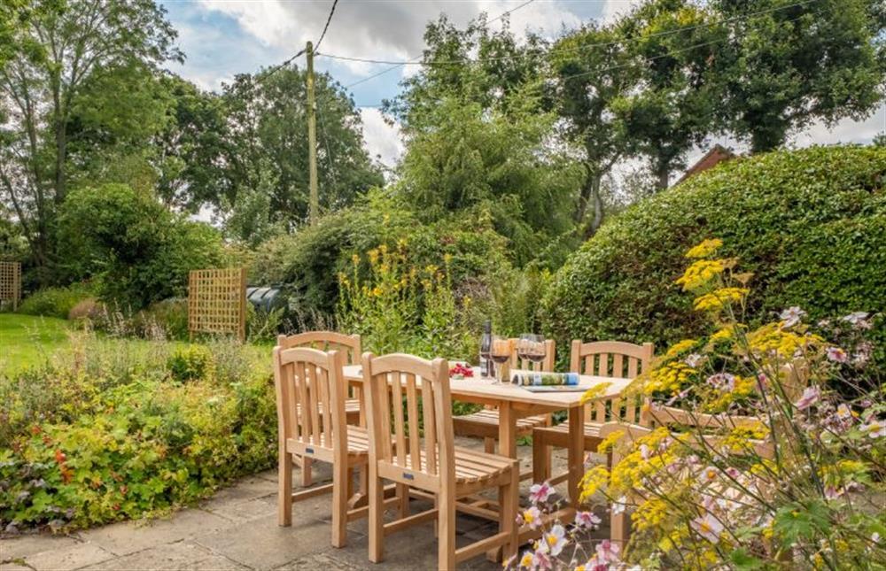 Front garden with seating for six at Loke Cottage, Bessingham near Norwich