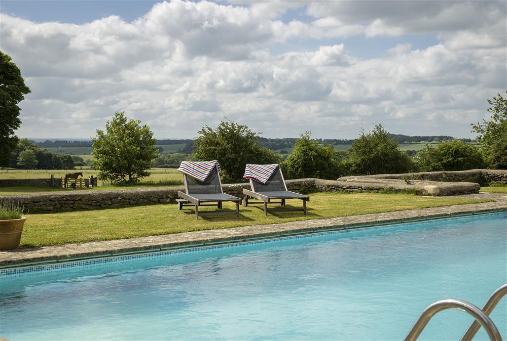 Be sure to relax and enjoy the glorious country views from the pool at Long Barn, near Cirencester