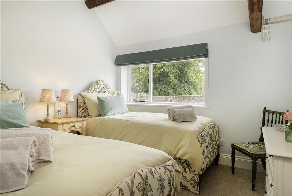 Ground floor: Bedroom two with twin 3ft single beds at Long Barn, near Cirencester