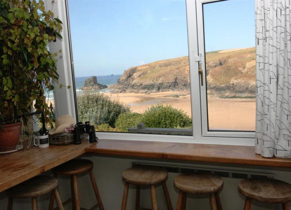 Breakfast bar with views over Porthcothan Bay at Long Cove in Porthcothan