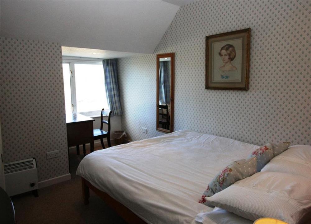 Comfortably furnished double bedroom at Long Cove in Porthcothan