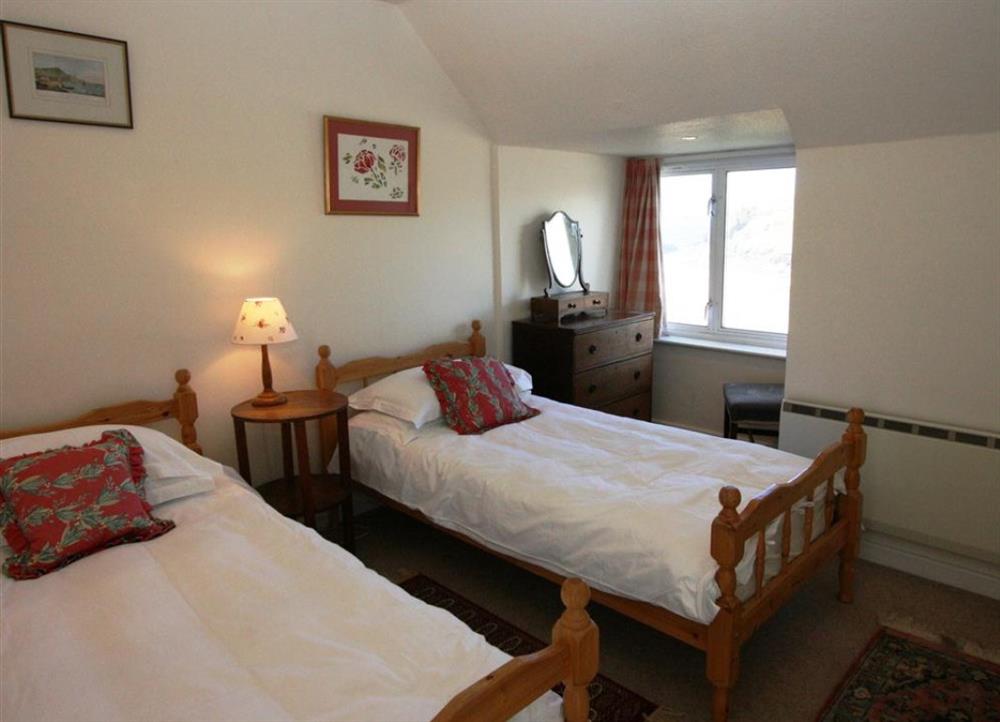 Comfortably furnished twin bedroom (photo 2) at Long Cove in Porthcothan