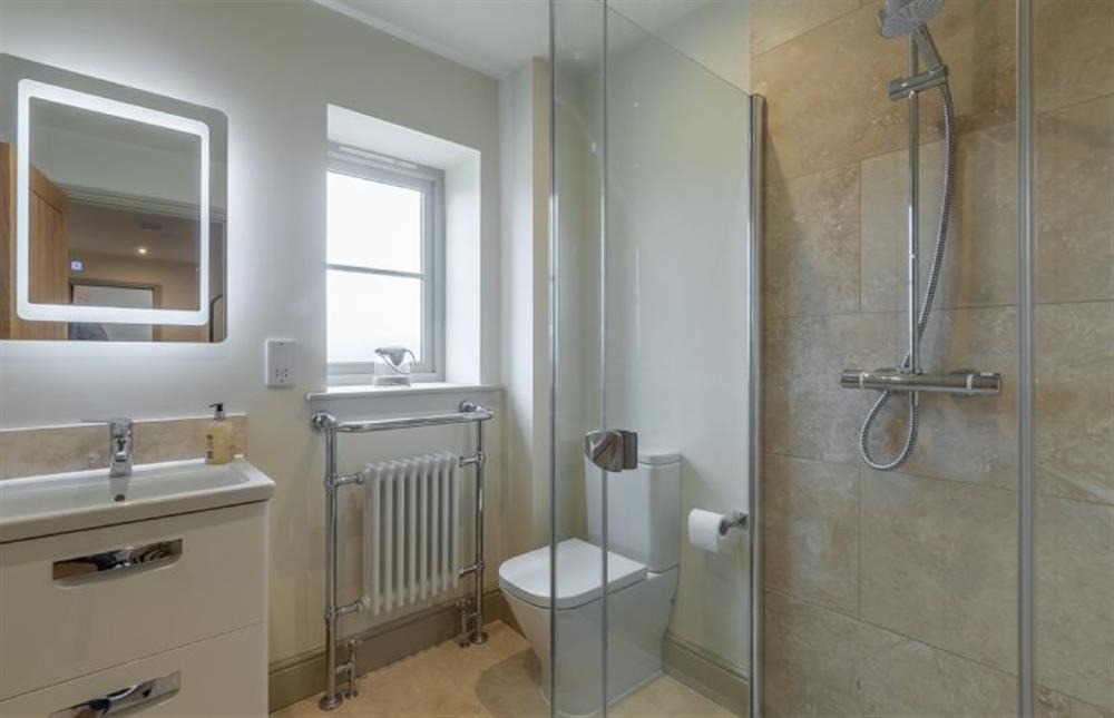 First floor: Bathroom with bath and separate shower at Long Meadow, Great Bircham near Kings Lynn