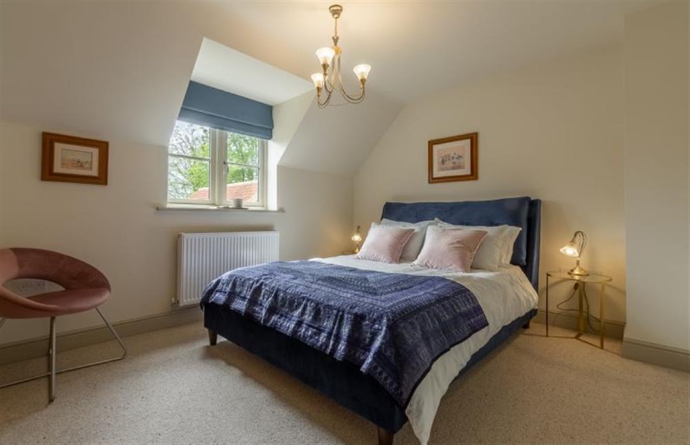 First floor: Bedroom two, king-size bed at Long Meadow, Great Bircham near Kings Lynn