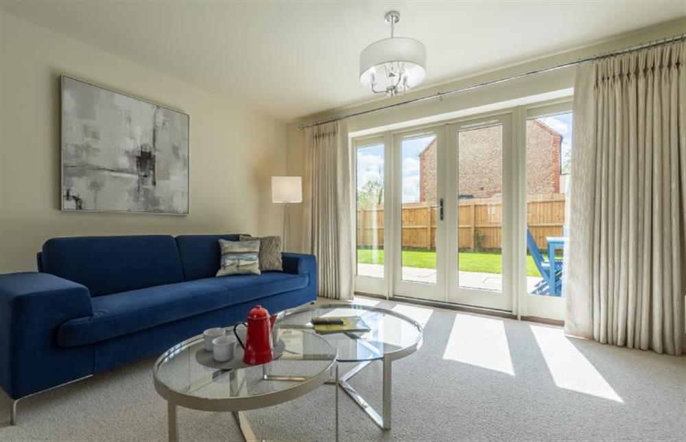 Ground floor: The sitting room and garden at Long Meadow, Great Bircham near Kings Lynn