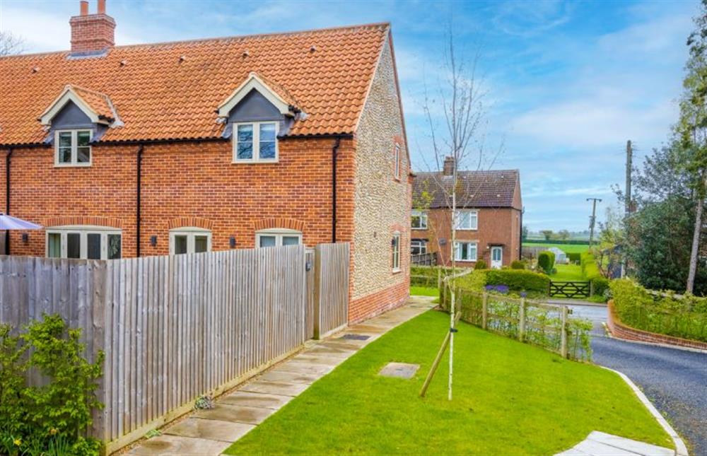 Long Meadow is a semi-detached new build brick and flint property set in the heat of Norfolk’s undulating fields