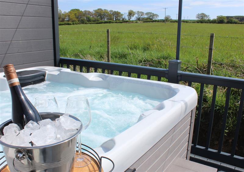 Relax in the hot tub at Long View Lodge, Felton