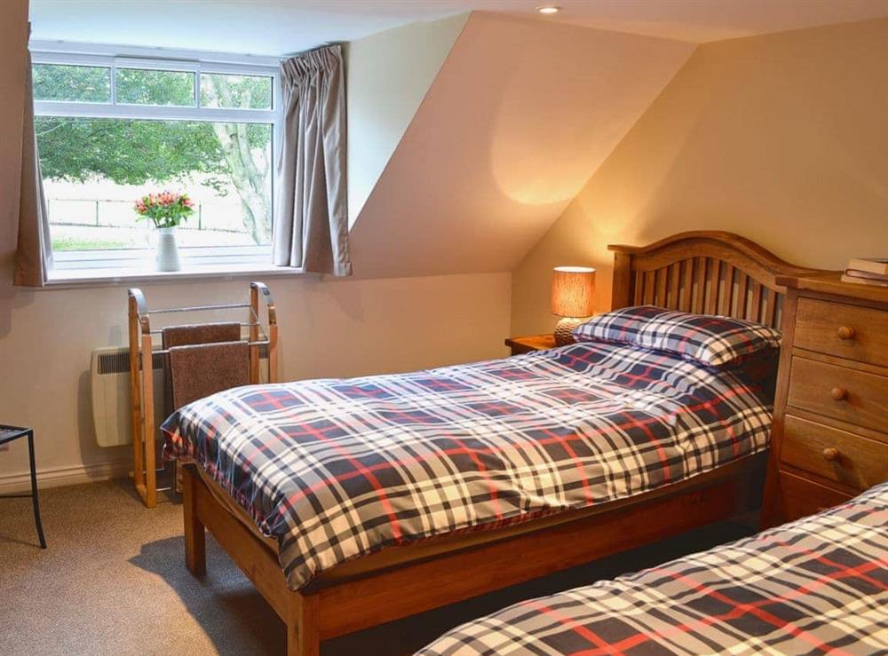 Twin bedroom at Longcroft Cottage in Oyne, near Insch, Aberdeenshire