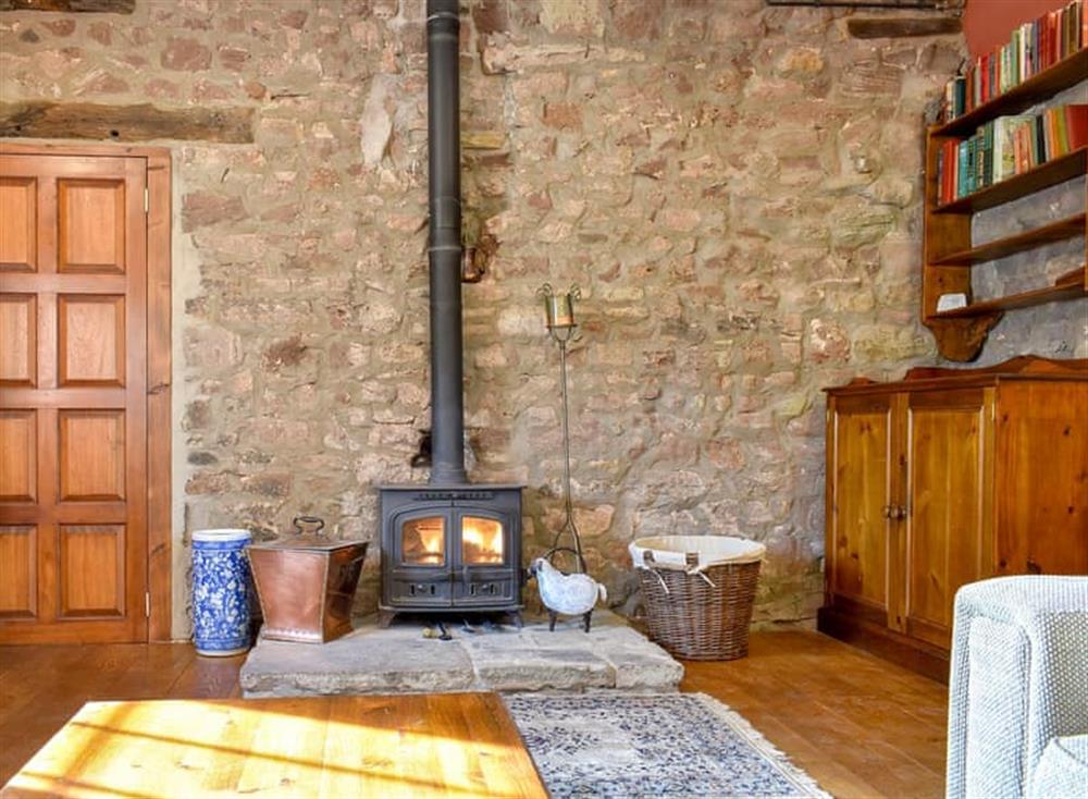 Spacious living room with cosy wood burner (photo 2) at Longfellow in Goodrich, near Ross-on-Wye , Herefordshire
